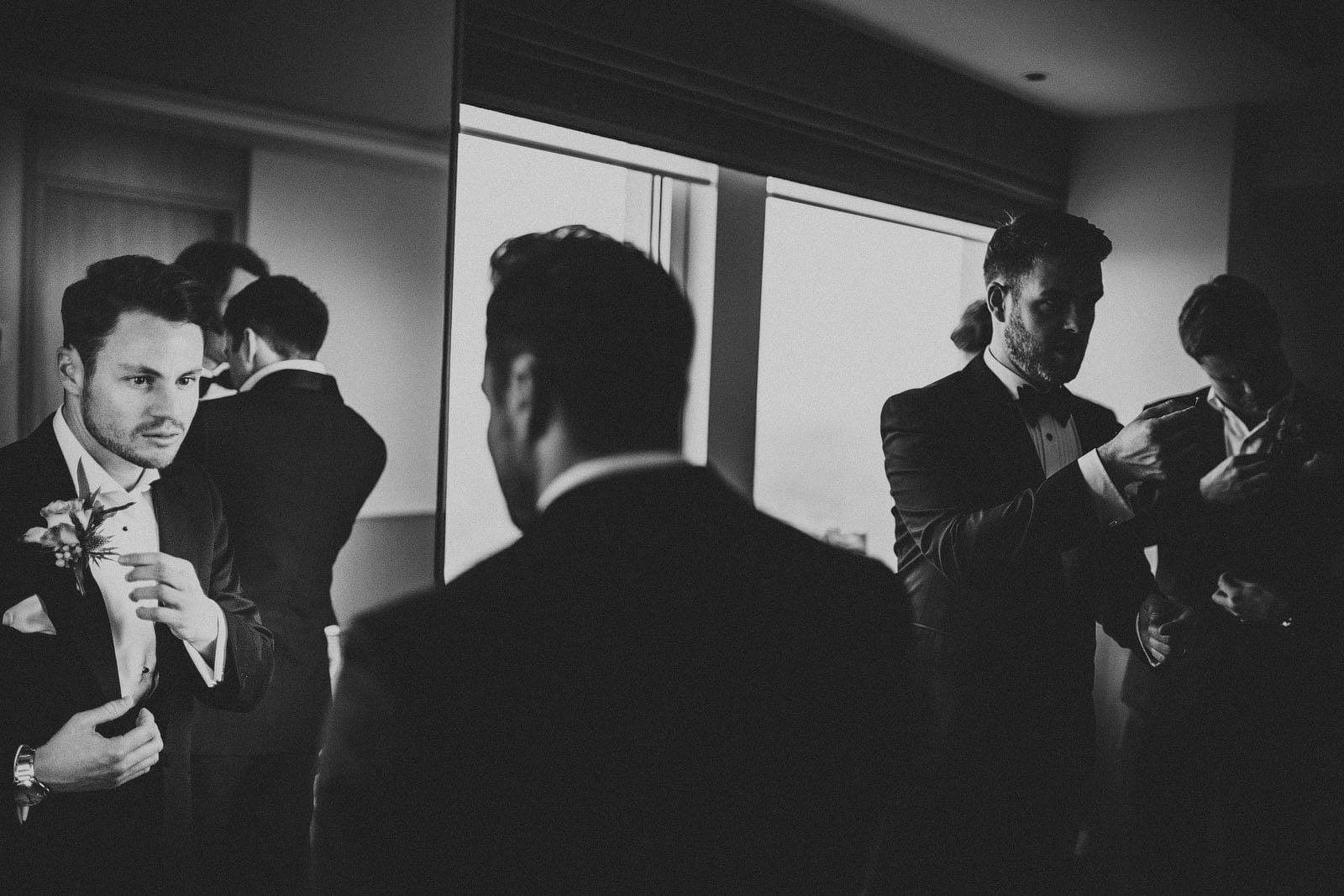 Groom getting ready at the Royal Lancaster Hotel