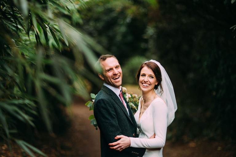 Bride and Groom in grounds of Hawkstone hall 